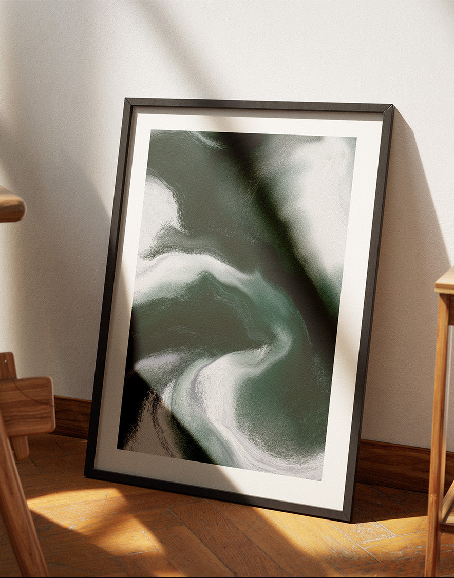Framed contemporary abstract artwork "Measured Against" from the Infinite Studio series by Nicole Potrich featuring deep green and white fluid marble-inspired abstraction exploring comparison and emotional tension.