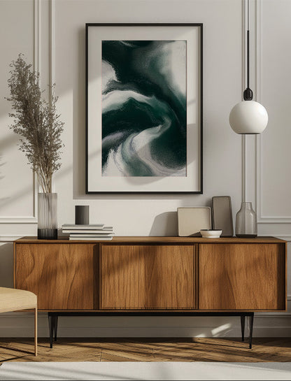 Framed contemporary abstract artwork "Measured Against" from the Infinite Studio series by Nicole Potrich featuring deep green and white fluid marble-inspired abstraction exploring comparison and emotional tension mounted on a wall in a modern livingroom.