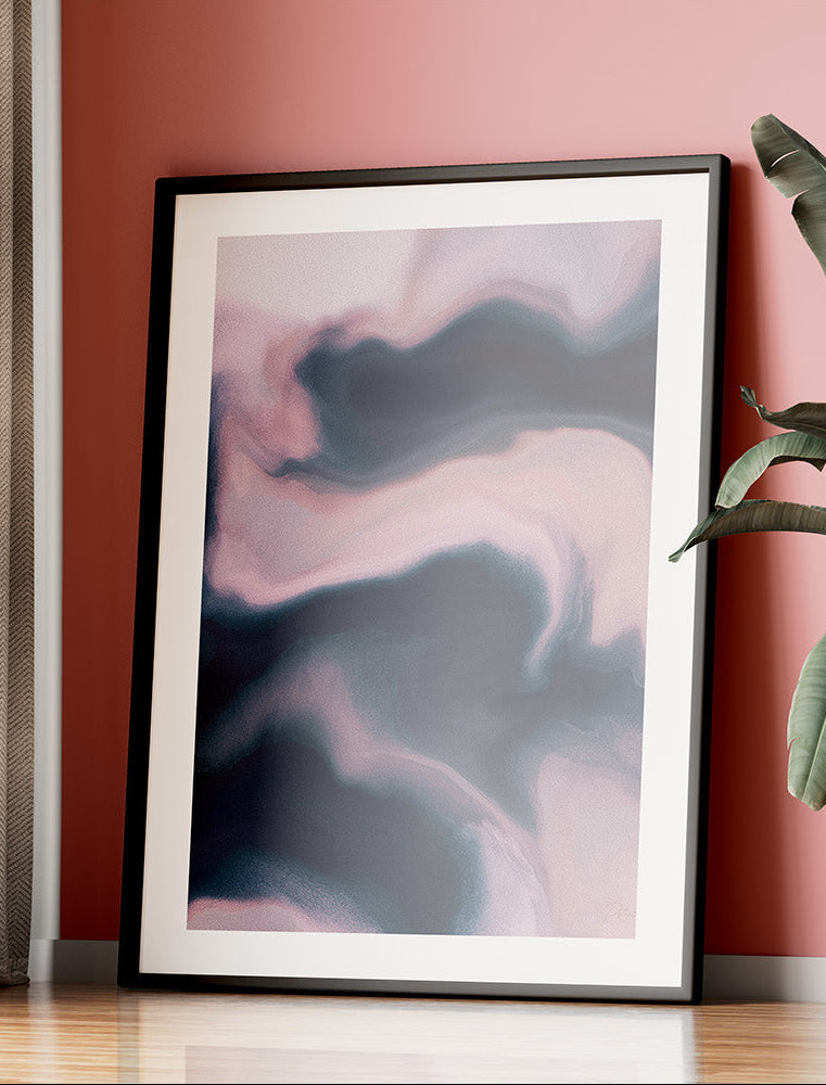 Framed contemporary abstract artwork "Soft Admission" from the Infinite Studio series by artist Nicole Potrich featuring blush and slate tones with fluid marble-inspired abstraction and layered texture. Leaning towards red wall.