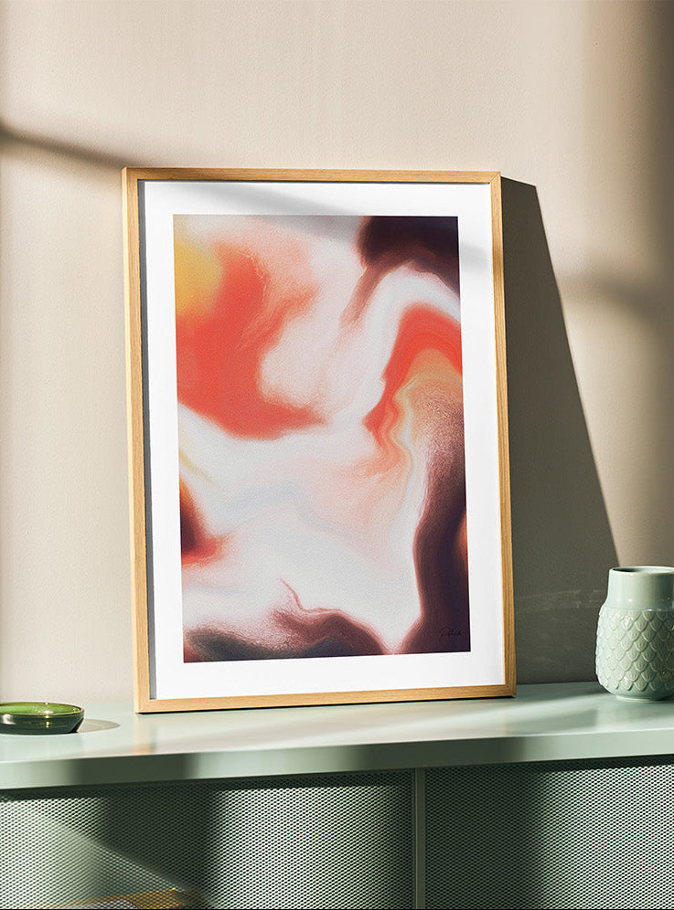 Contemporary abstract artwork "Speaking Anyway" from the Infinite Studio series by Nicole Potrich featuring white and warm orange fluid abstract forms and marble-like textures framed on a teal table.