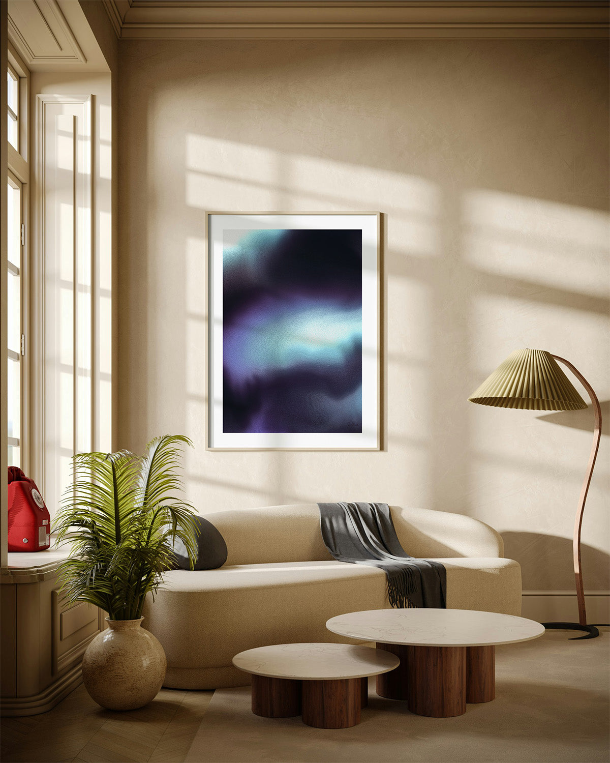Framed contemporary abstract artwork "Crossing Over" from the Infinite Studio series by Nicole Potrich featuring deep blue and cyan fluid abstraction with layered marble-inspired textures mounted on a wall in a cozy livingroom.