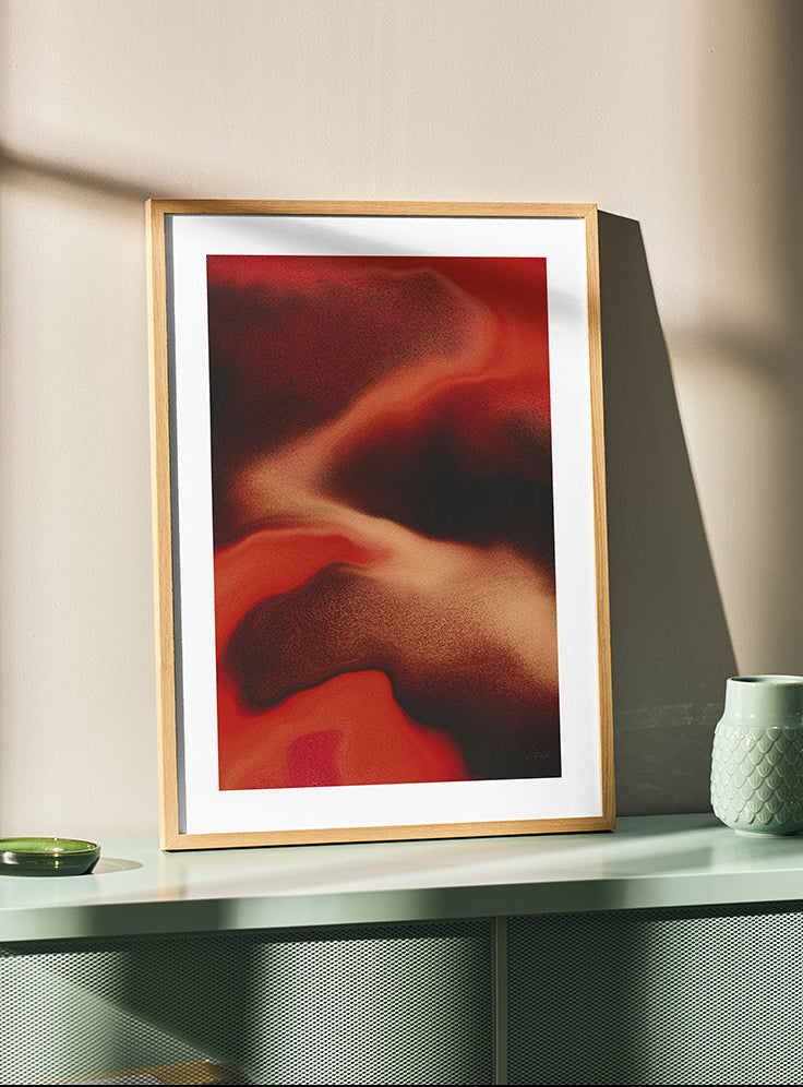 Framed contemporary abstract artwork "Contained Heat" from the Infinite Studio series by London-based artist Nicole Potrich, featuring deep red fluid marble-inspired textures and layered abstract movement.