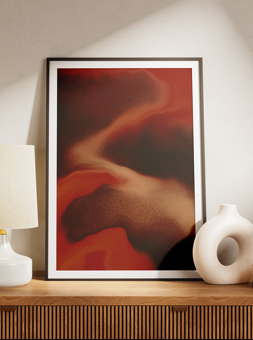 Framed contemporary abstract artwork "Contained Heat" from the Infinite Studio series by London-based artist Nicole Potrich, featuring deep red fluid marble-inspired textures and layered abstract movement.