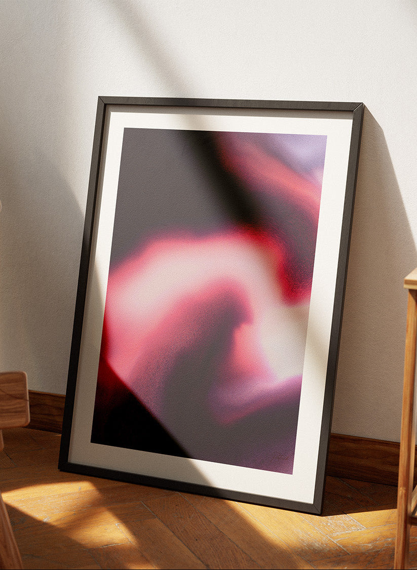 Framed contemporary abstract artwork "Becoming" from the Infinite Studio series by Nicole Potrich featuring magenta and black fluid marble-inspired abstraction symbolising transformation and emergence.