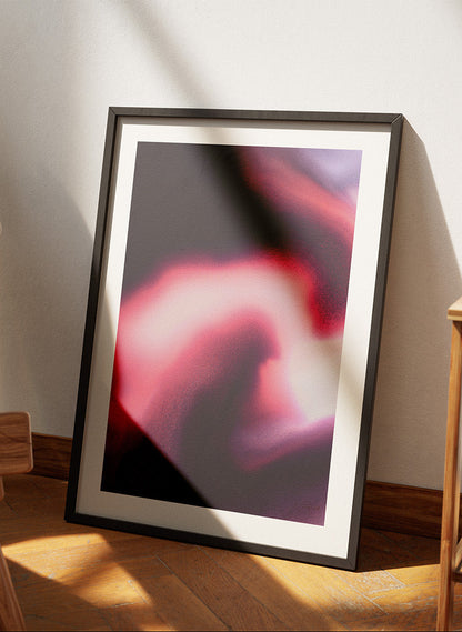 Framed contemporary abstract artwork "Becoming" from the Infinite Studio series by Nicole Potrich featuring magenta and black fluid marble-inspired abstraction symbolising transformation and emergence.
